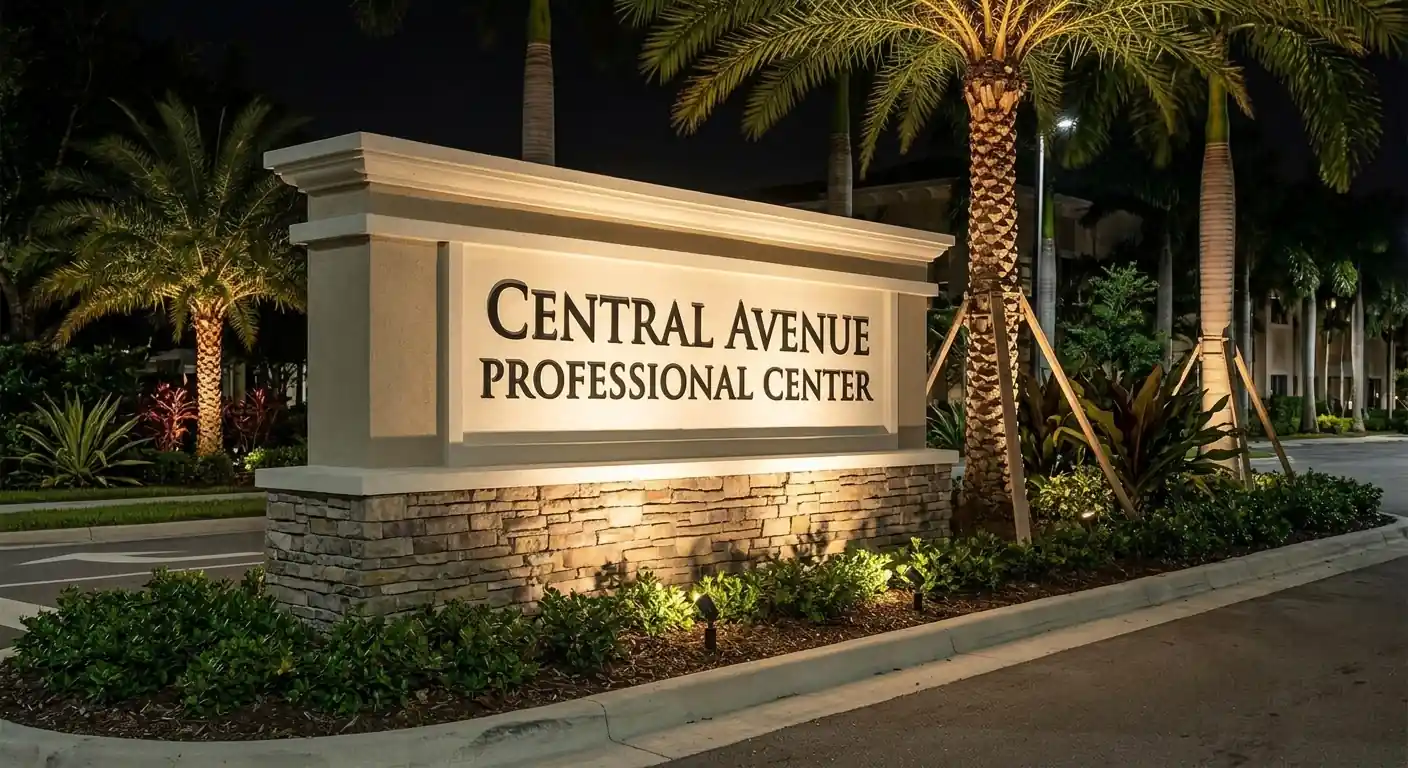 Illuminated monument sign for a professional center at dusk
